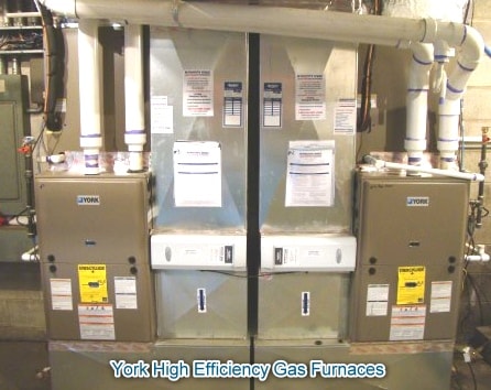 Side-by-side, high efficiency York gas furnace retrofit with air conditioning and high efficiency air cleaners. Double Gas furnace replacement