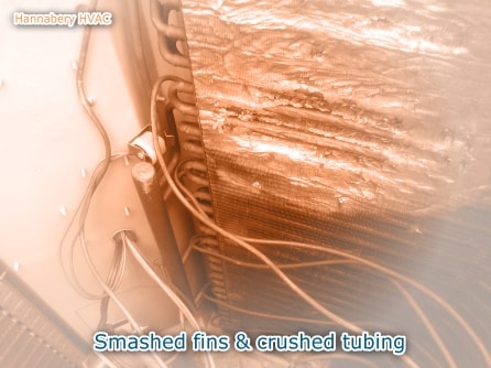 Outdoor coil fins and tubing smashed due to bent and broken fan blades. smashed outdoor coil